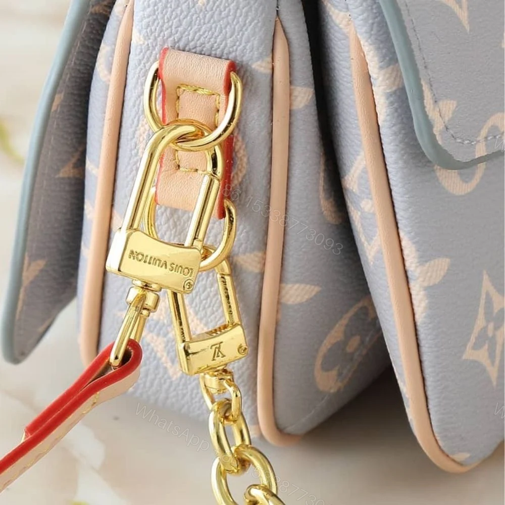 View 7 of Louis Vuitton Pochette Métis East West Coated Canvas Trianon 21Cm M12429