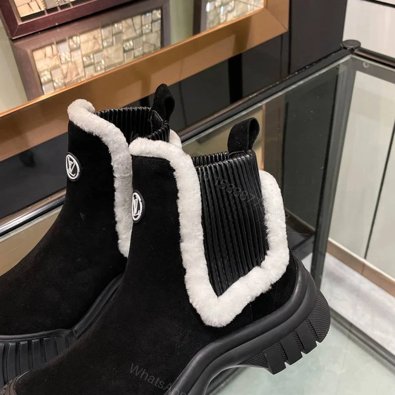 View 2 of LOUIS VUITTON RUBY FLAT BOOTS SUEDE CALFSKIN AND SHEARLING BLACK 1AC7AC