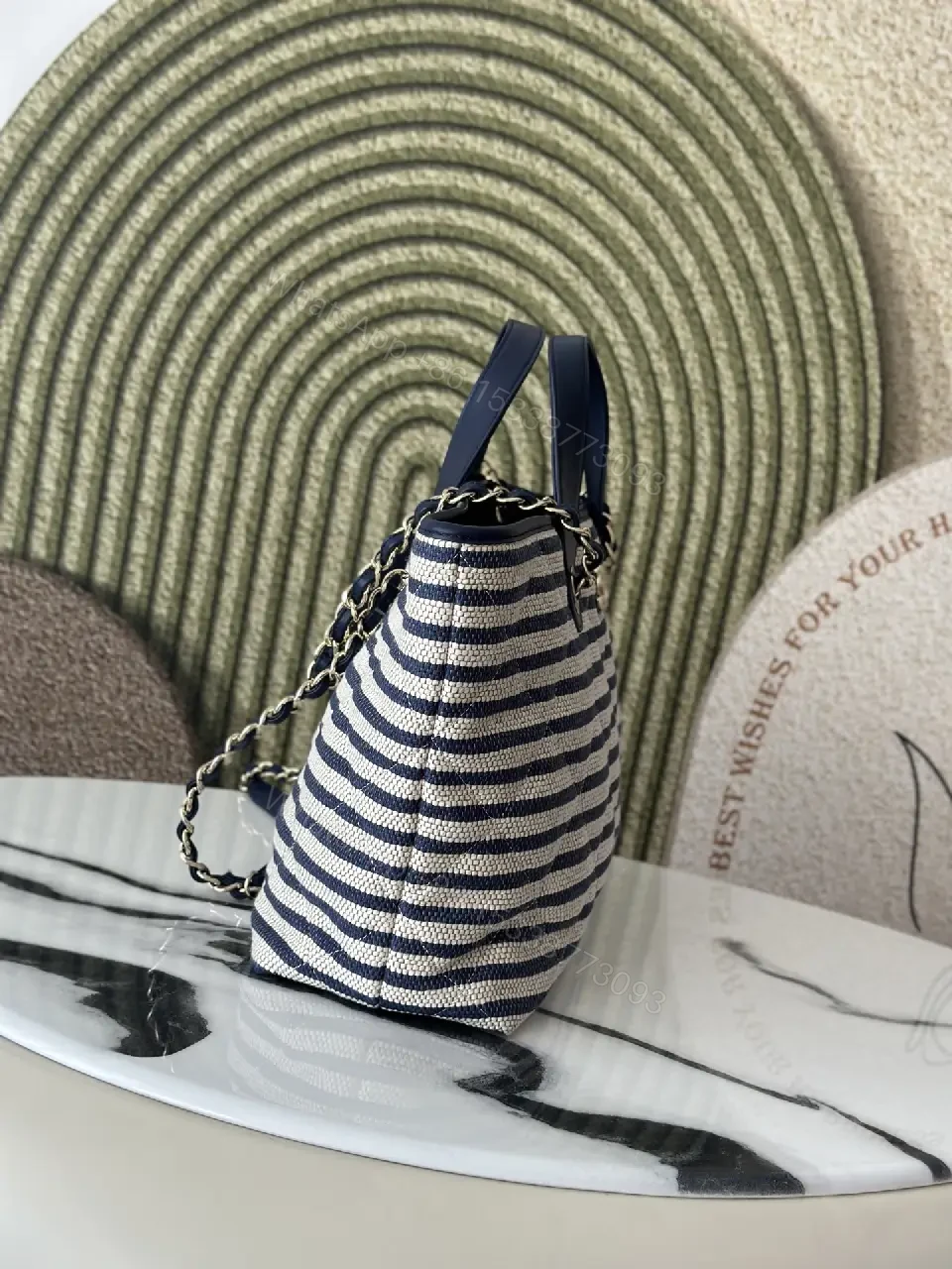 View 7 of Navy Stripe Woven Tote Bag with Leather Accents and Chanel Logo