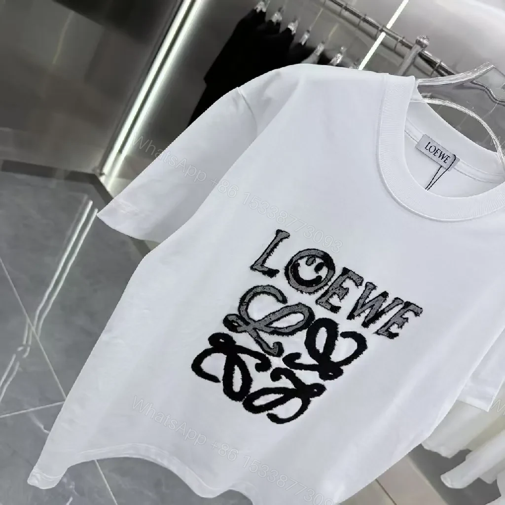 View 2 of Luxe Graphic Logo Tee – Elevated Statement Top