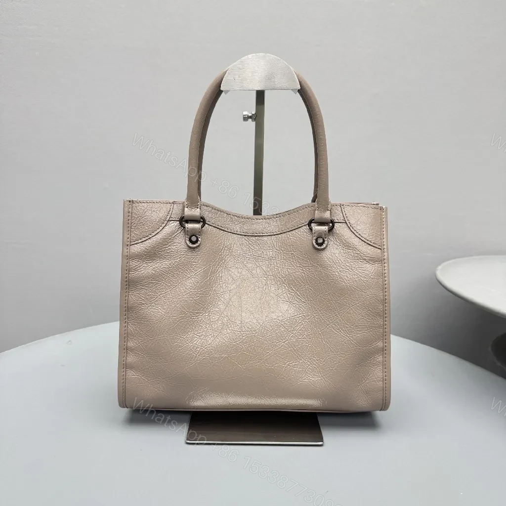 View 9 of Pebbled Leather Tote: City-Chic, Gunmetal Hardware, Crossbody-ready