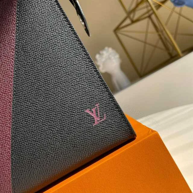 View 6 of LOUIS VUITTON POCHETTE VOYAGE MM TAIGA LEATHER M30718