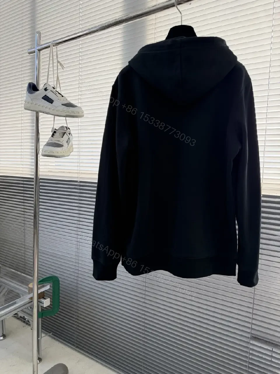 View 8 of Minimalist Logo Hoodie: Black Knit, Relaxed Streetwear Comfort