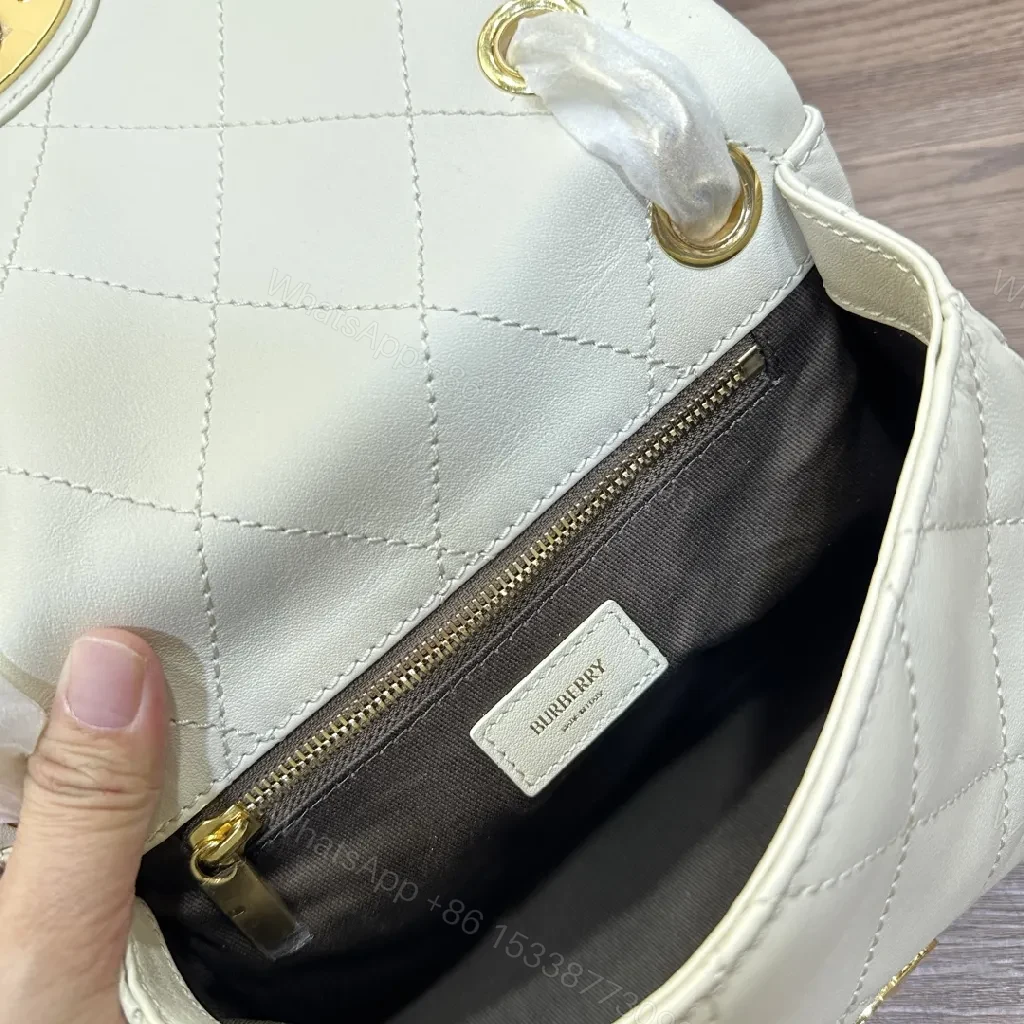 View 8 of Quilted Mini Crossbody: Diamond Stitch, Gold Hardware, Elegant Texture