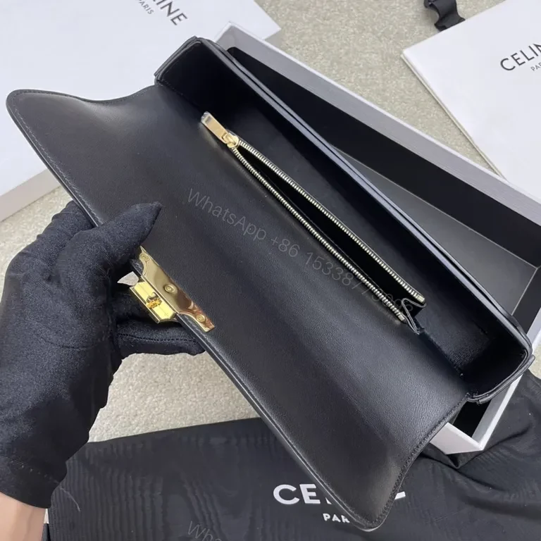 View 8 of Chic Black Leather Shoulder Bag â€“ Gold Logo Clasp, CELINE