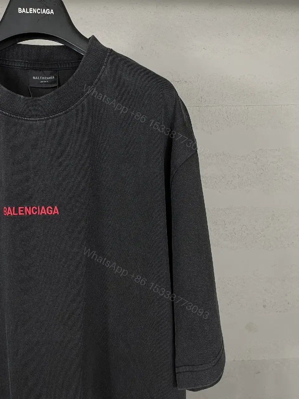 View 9 of Oversized Black Tee Dress with Subtle Red Logo, Modern Couture Edge