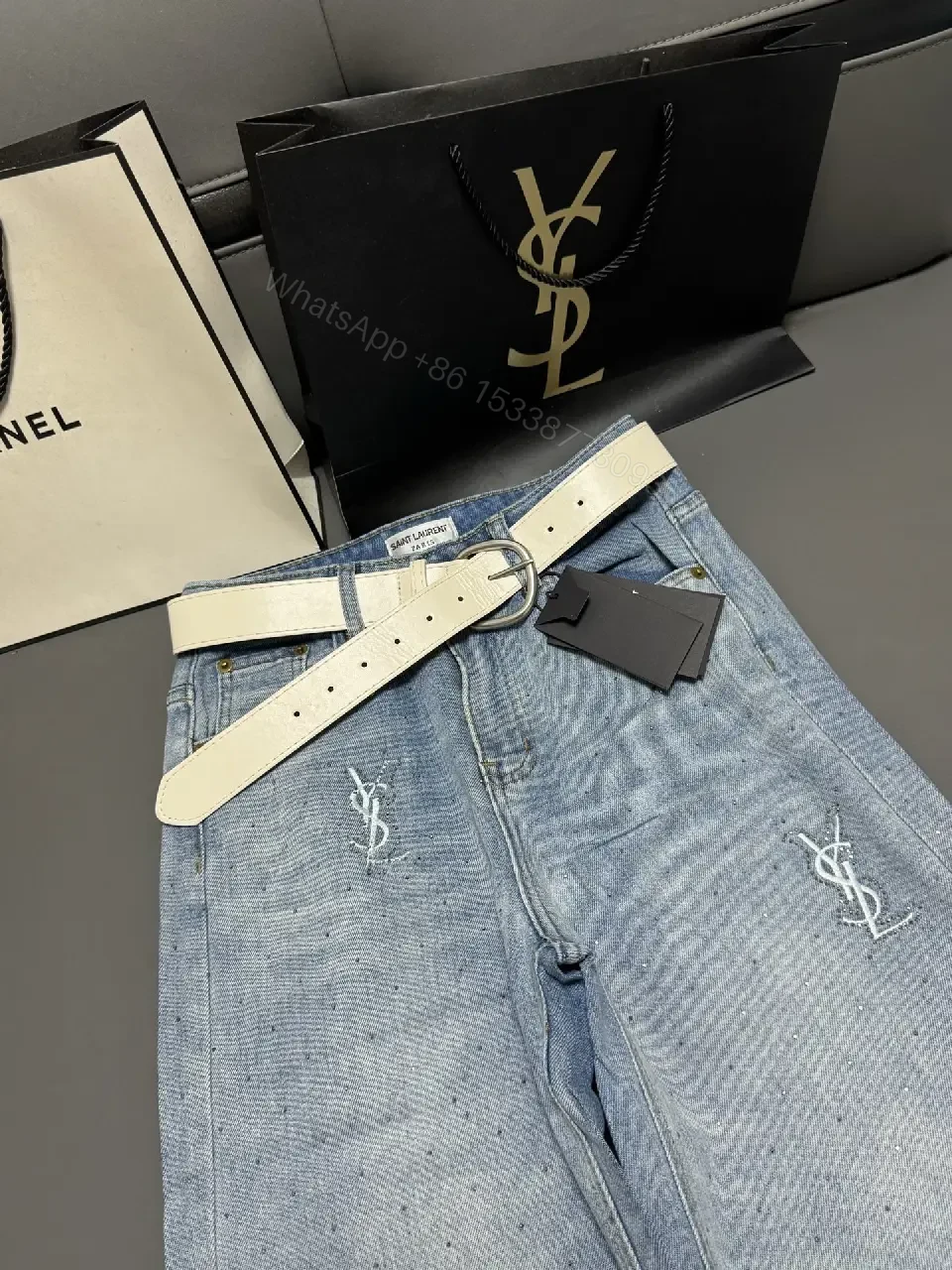 View 6 of Chic Distressed Couture: Wide-Leg Jeans with Emblems