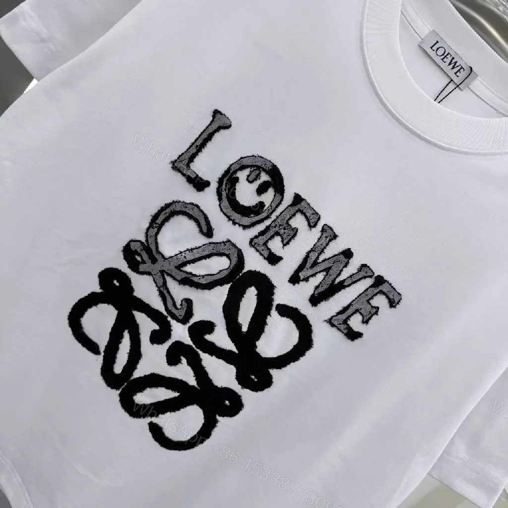 View 3 of Luxe Graphic Logo Tee – Elevated Statement Top
