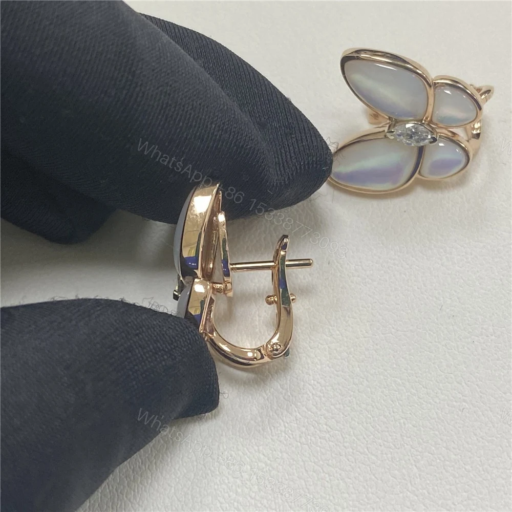 View 3 of Van Cleef & Arpels Two Butterfly Mother Of Pearl And Diamond Earrings VCARO8FN00