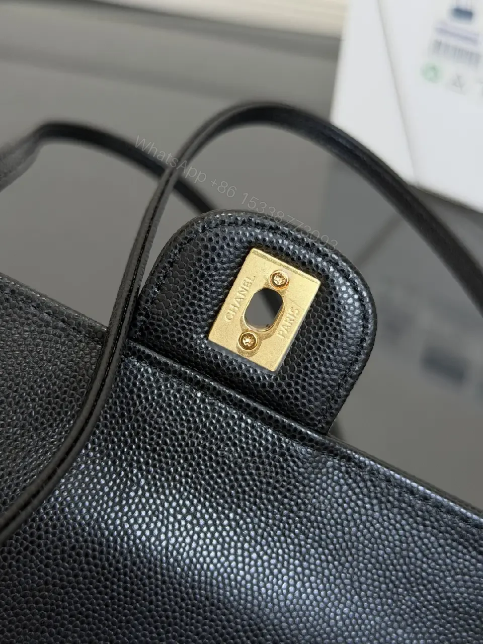 View 3 of Black Grain Leather Crossbody Bag – Gold Twist, Compact & Versatile