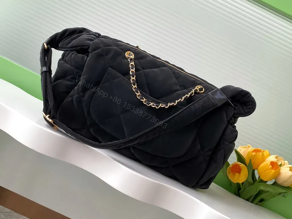 View 8 of Chic Quilted Black Bag with Gold Chain Detail - Compact Luxury