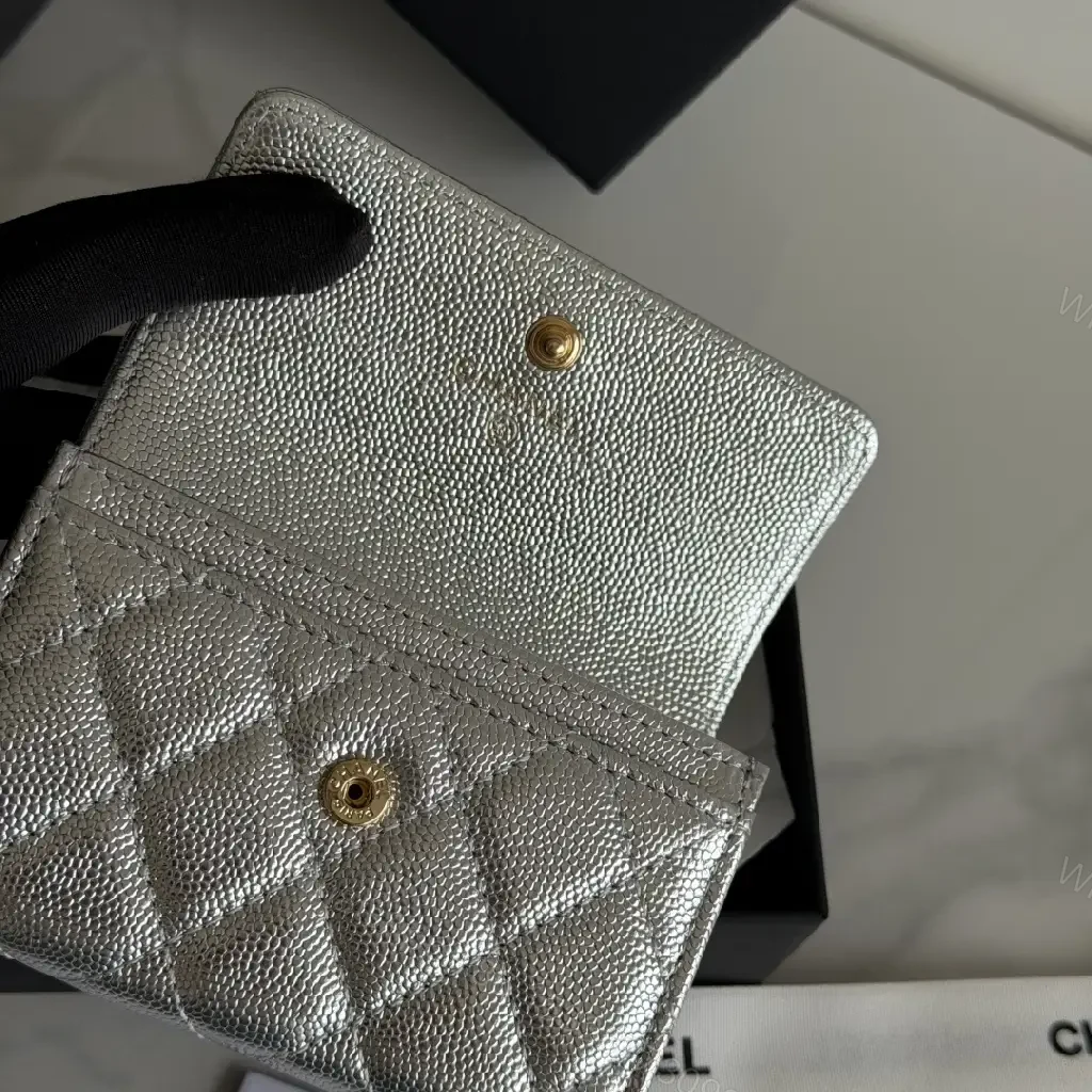 View 10 of Metallic Silver Leather Quilted Flap Wallet, Compact Bi-fold with Gold CC Logo