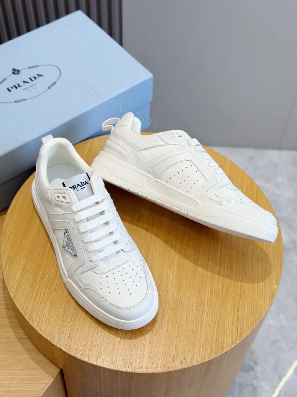 View 4 of White Leather Sneakers Minimalist Cushioning Prada Style Sneakers