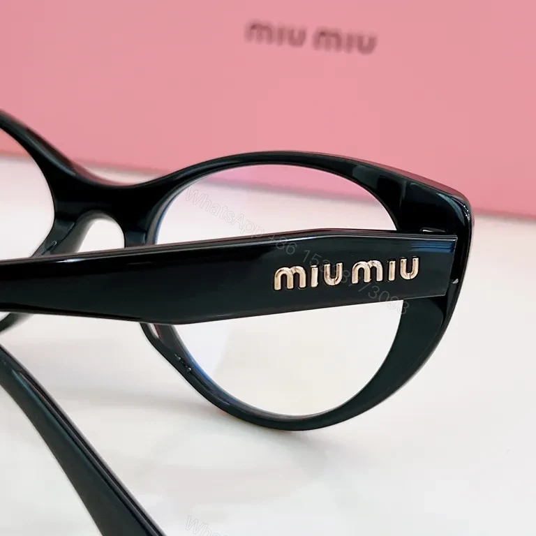 View 6 of Miu Miu Black Cat-Eye Eyewear: Everyday Luxury