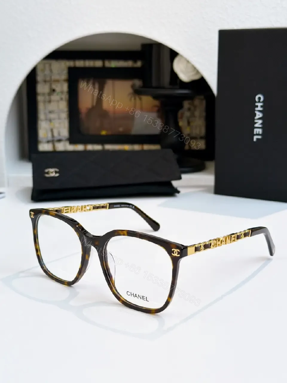 View 6 of Clear Translucent Frame Modern Oversized Sunglasses with CHANEL Accents