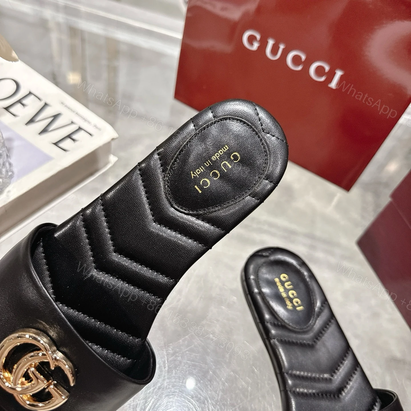 View 7 of GUCCI WOMEN SLIDE SANDAL WITH DOUBLE G BLACK ‎832449 BKO00 1000