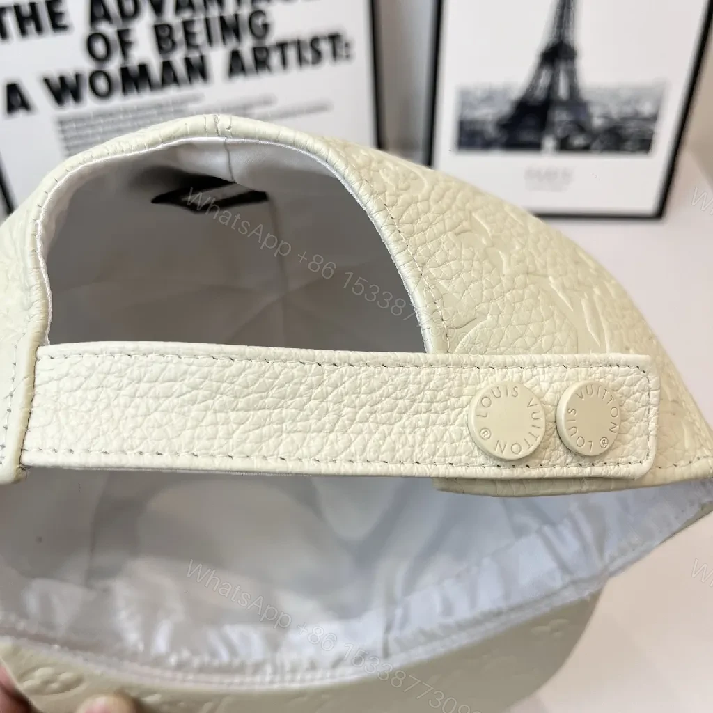 View 3 of White Embossed Cap with Subtle Monogram Texture (Casual Luxury)