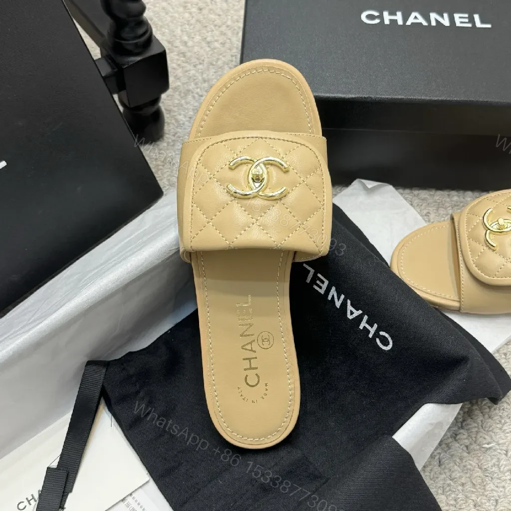 View 8 of Beige Quilted Leather Sliders with Gold Logo—Elegant Comfort
