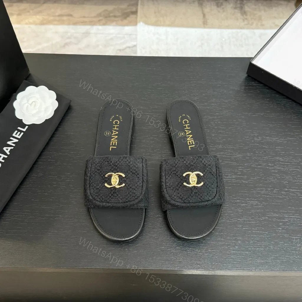 View 8 of Quilted Black Slip-Ons with Gold Logo – Luxury Comfort