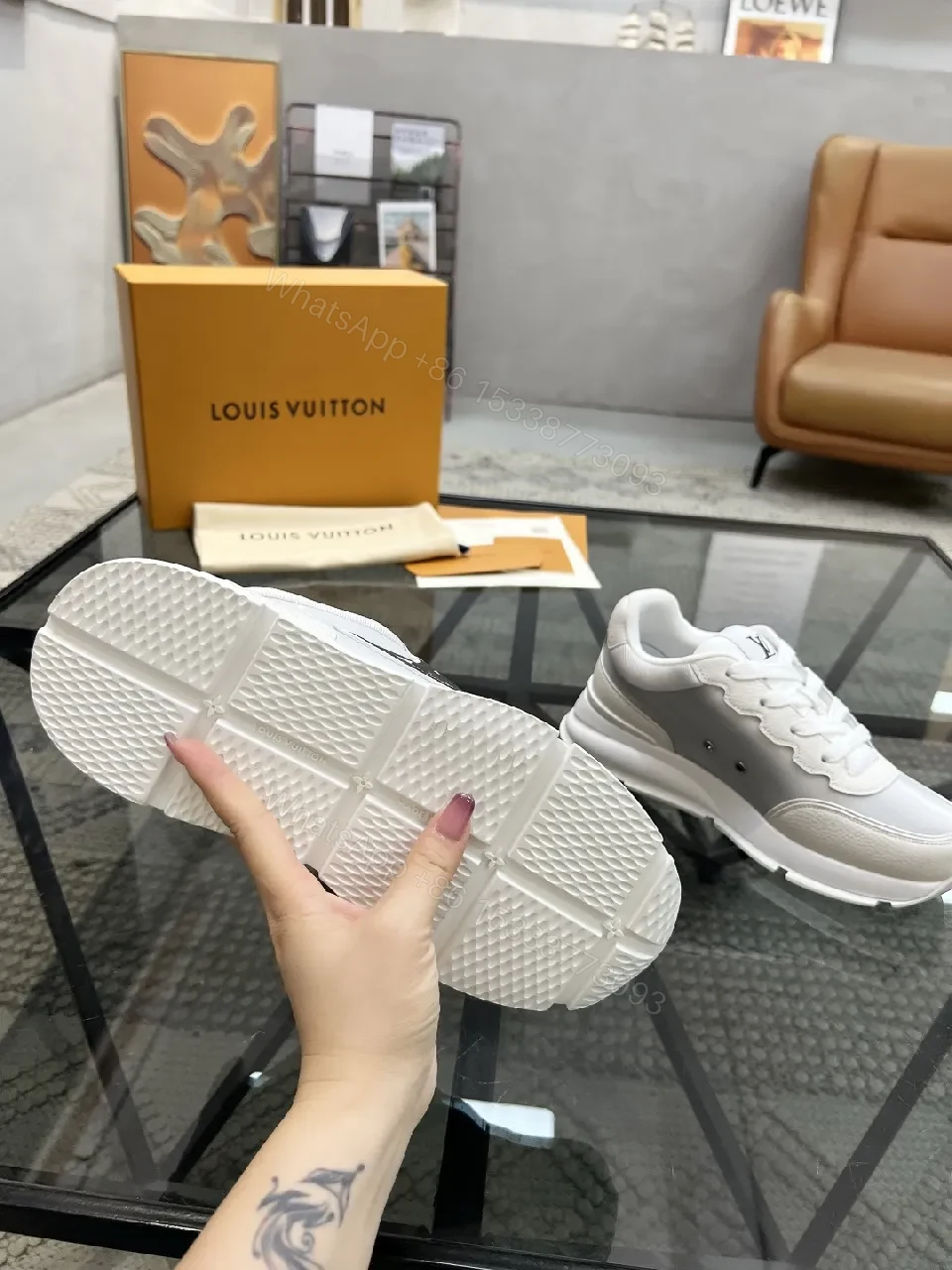 View 5 of White Leather Minimalist Luxe Sneakers with LV Detail