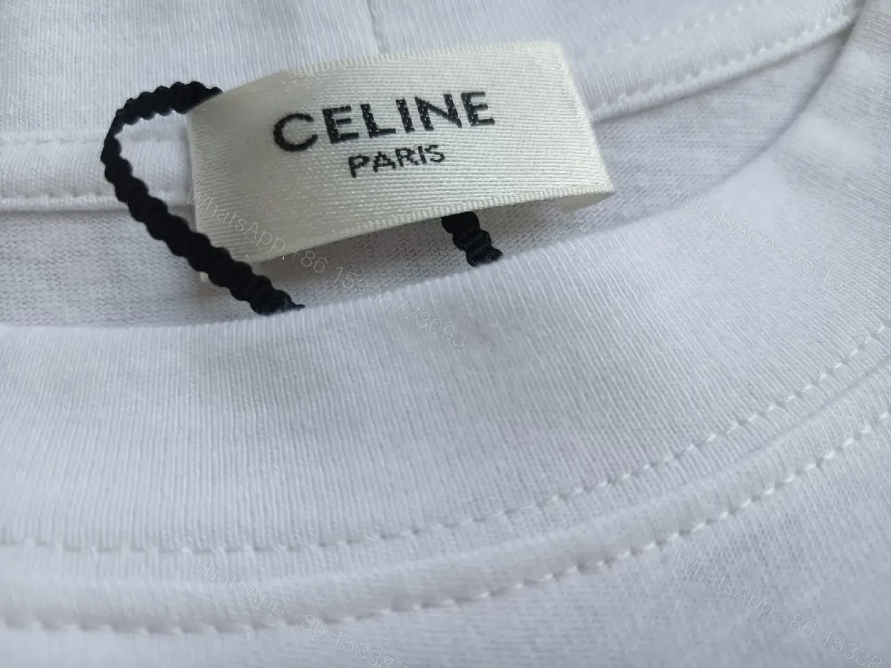 View 7 of Minimalist White Cotton Tee - Relaxed Luxe Comfort
