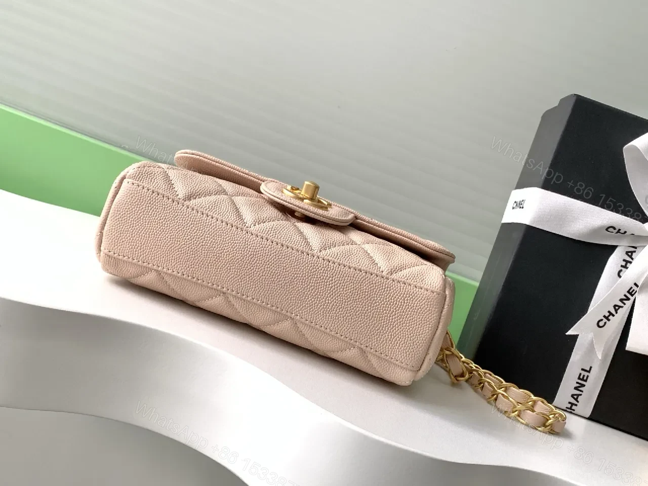 View 6 of Soft Pink Quilted Flap Bag with Gold Chain - Compact Luxury