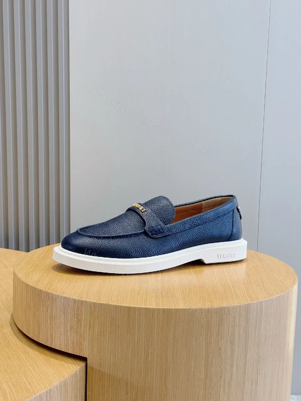 View 2 of Navy Leather Slip-On Loafers with Gold Branding