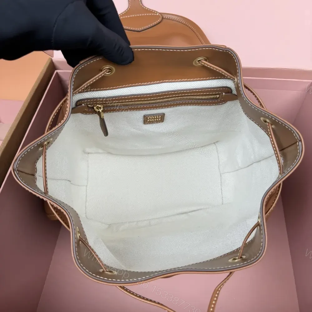 View 9 of 高仿miumiu*5BZ042牛皮雙肩包棕色大號免檢版