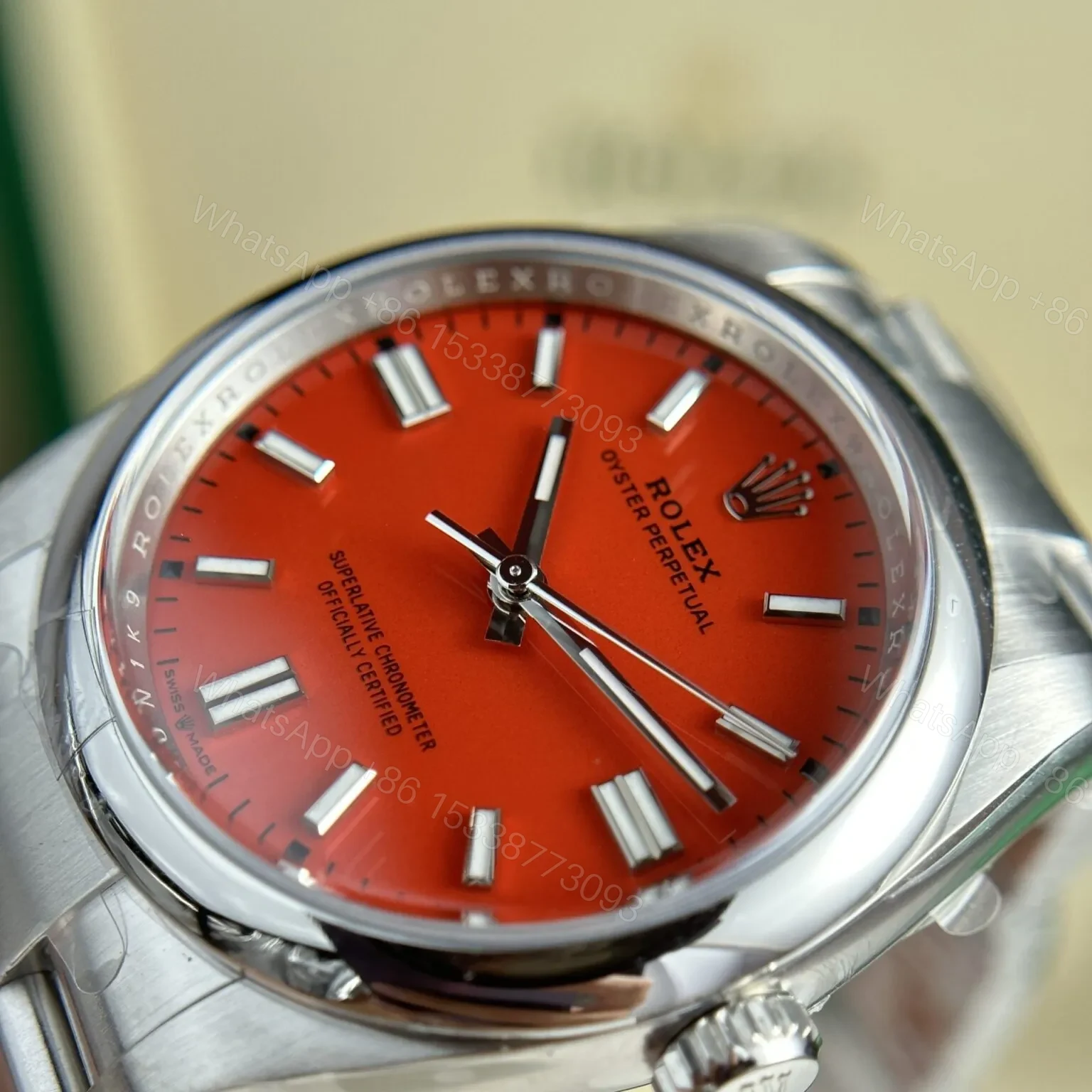 View 4 of Replica Rolex Oyster Perpetual Coral Red Dial 124300 41 mm