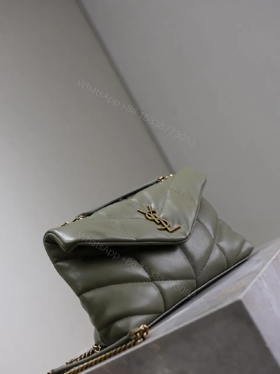 View 7 of Textured Olive Quilted Shoulder Bag with Gold Emblem, Compact Elegant Style