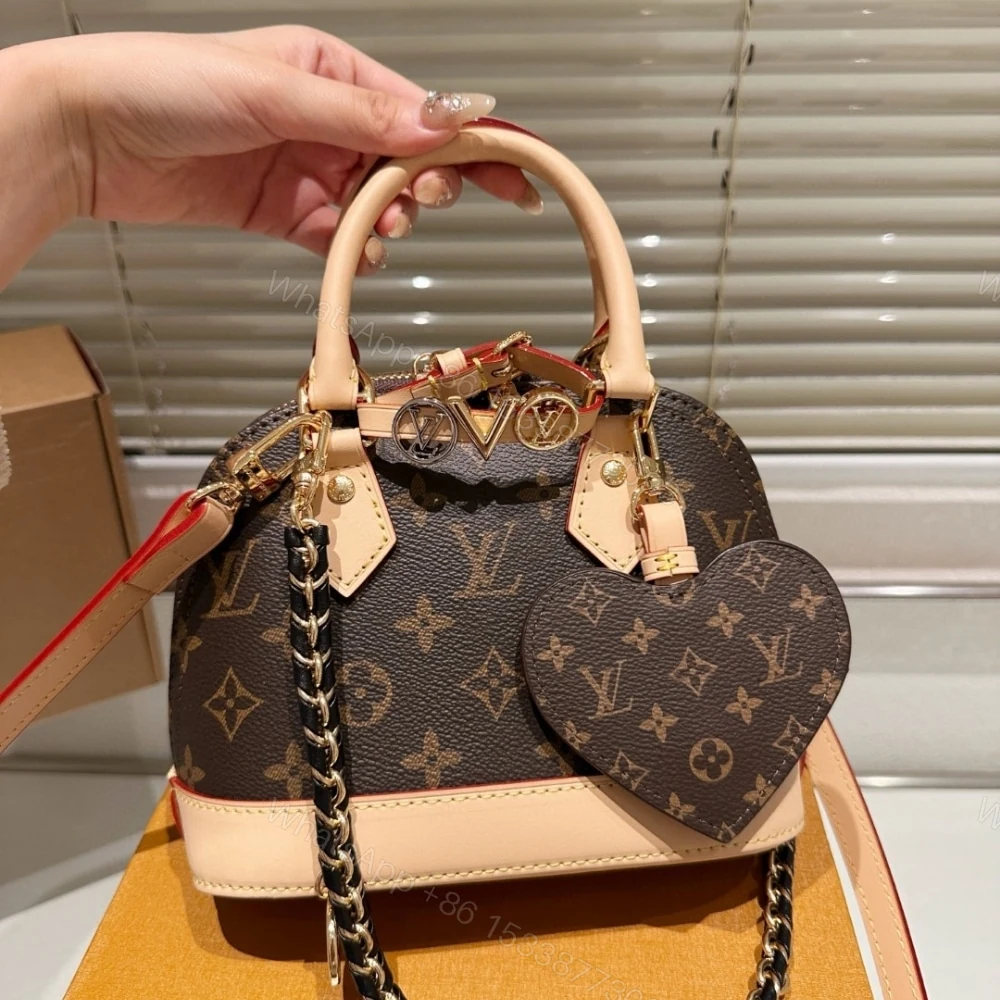 View 3 of Louis Vuitton Alma Mini LV And I Monogram Brown 25Cm K00016
