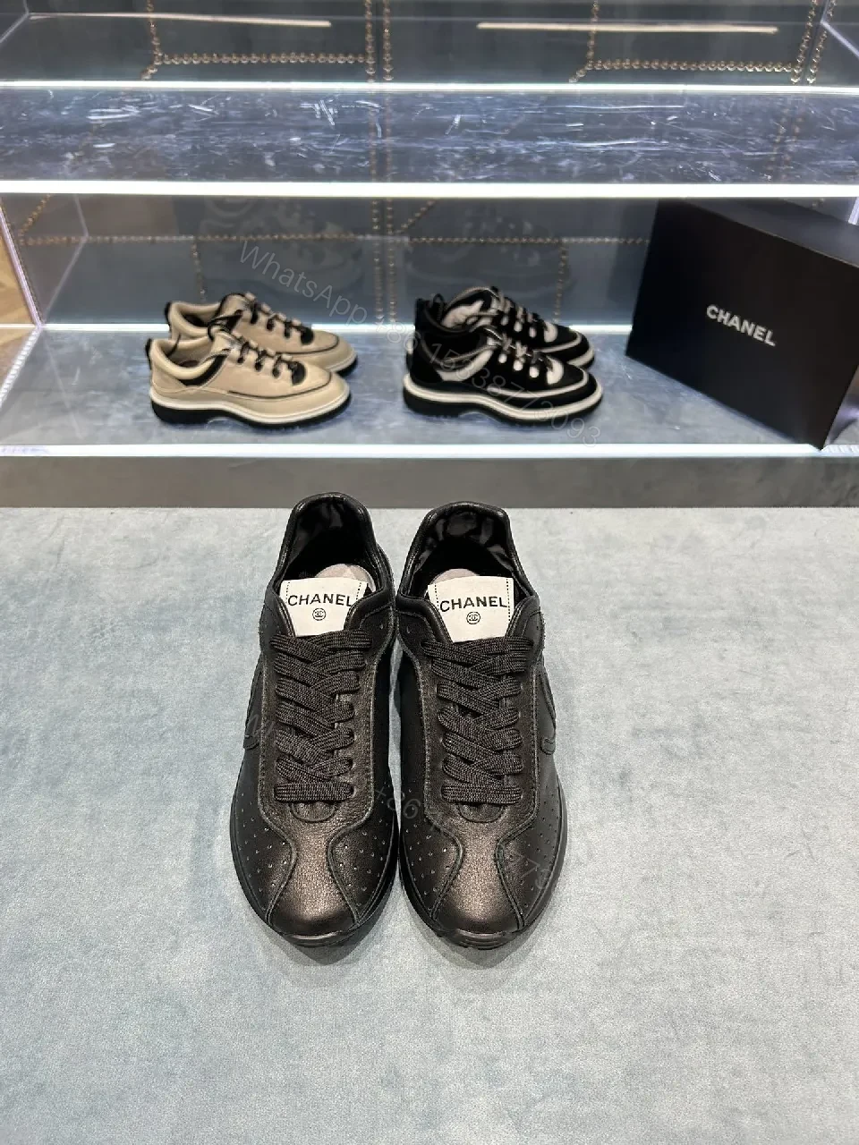 View 9 of Black Leather-Trim Sneaker with Perforations + Luxe Casual Sneakers