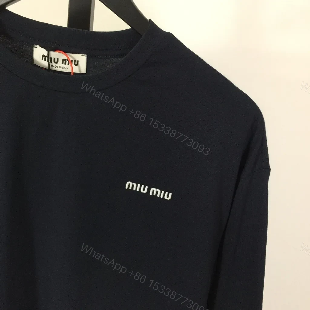 View 4 of Minimalist Navy Cotton Crewneck Sweatshirt with Subtle Logo