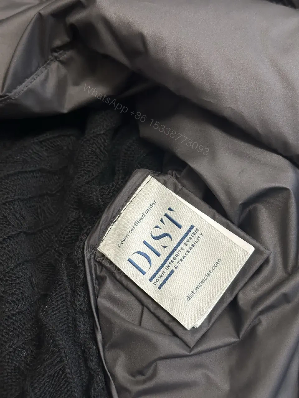 View 2 of Tech-Inspired Quilted Jacket with Knit Sleeves - Versatile Outerwear