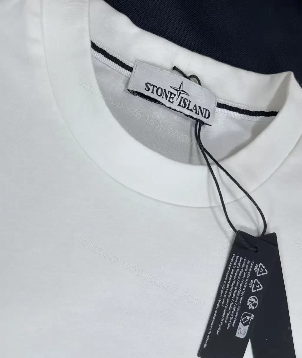View 4 of Minimalist White Tee with Subtle Logo – Premium Everyday Comfort