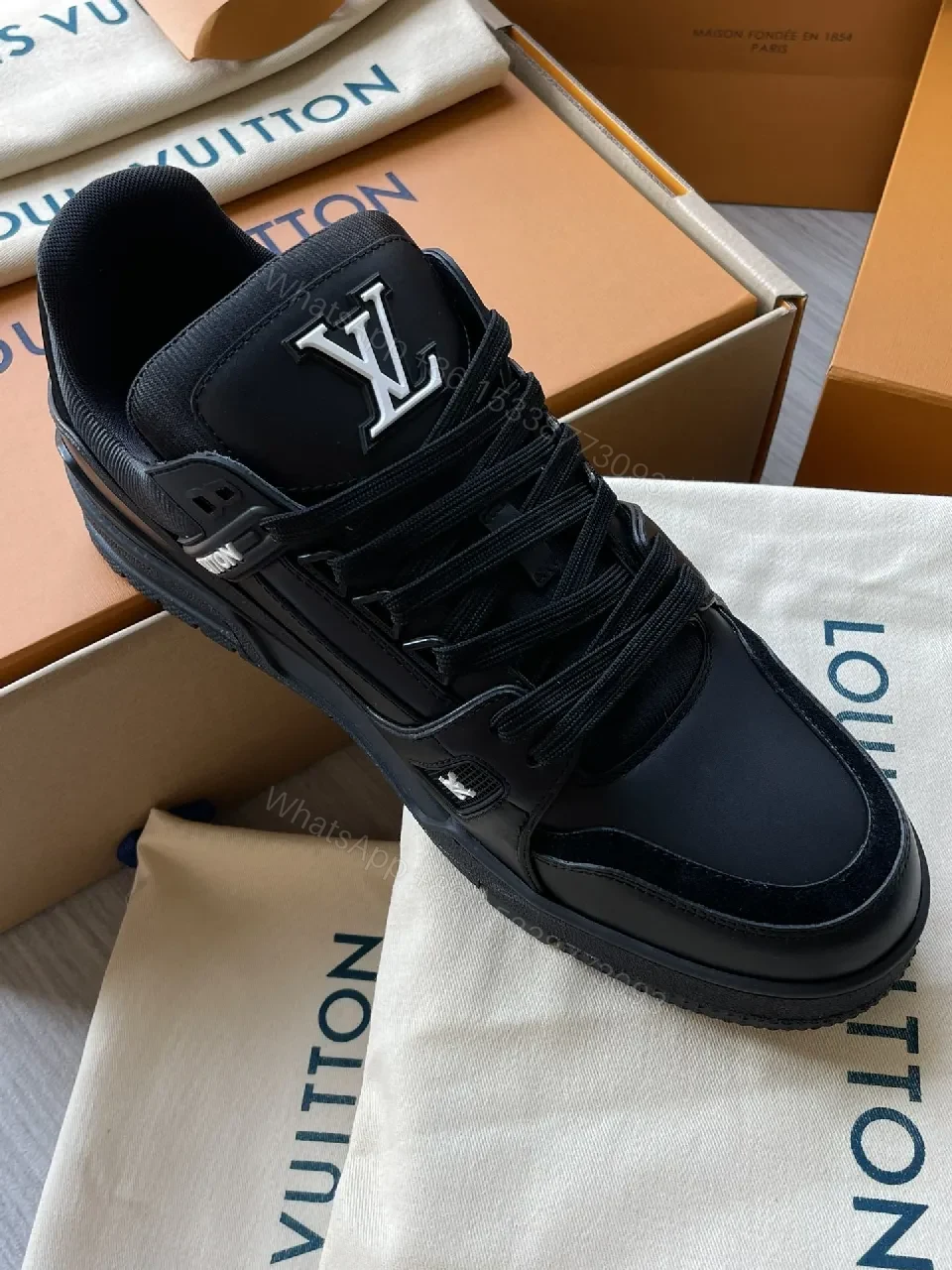 View 9 of Black Leather High‐Top Sneakers with LV Embellishments
