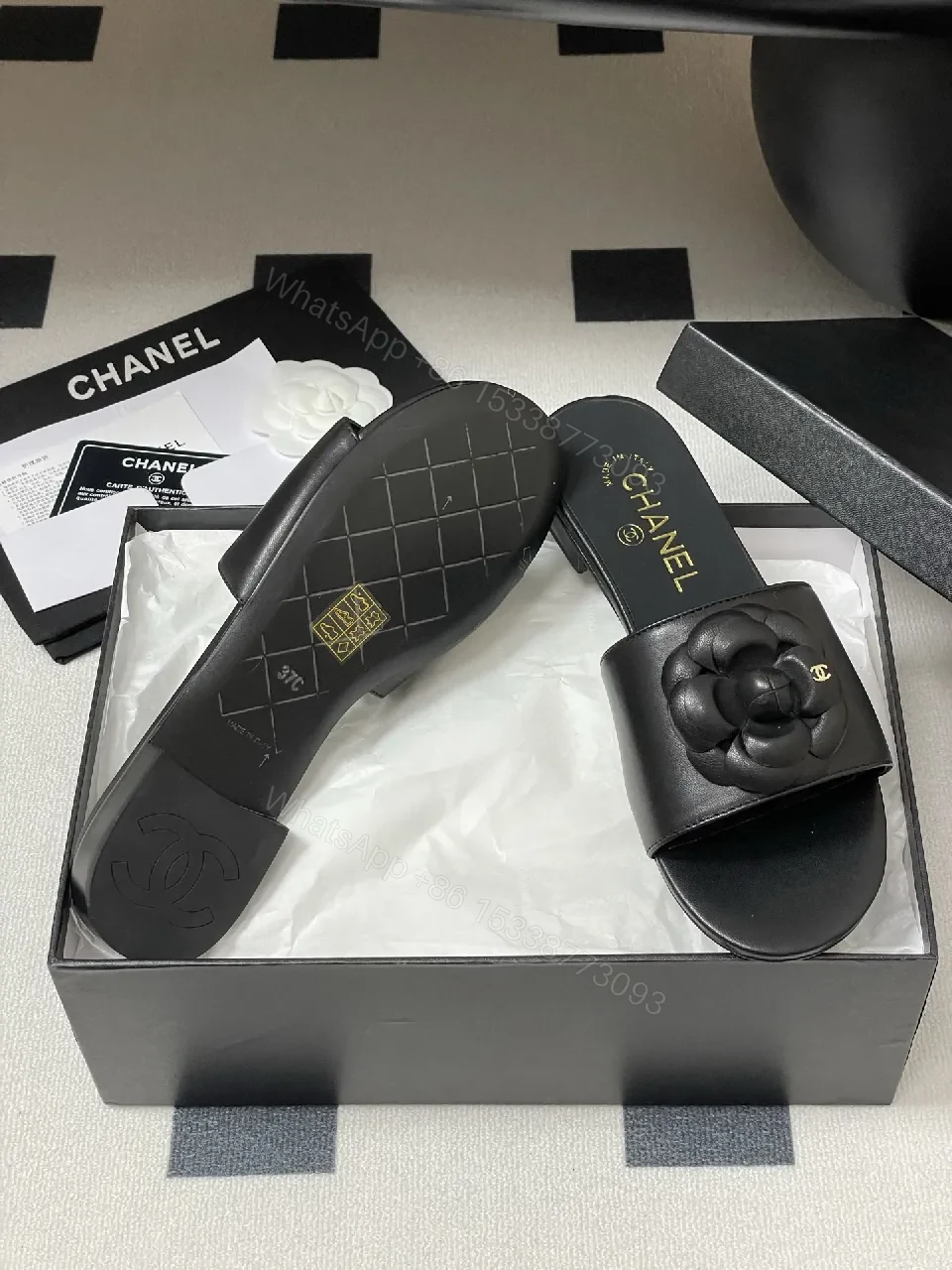 View 2 of Effortless Black Leather Slide with Camellia Detail