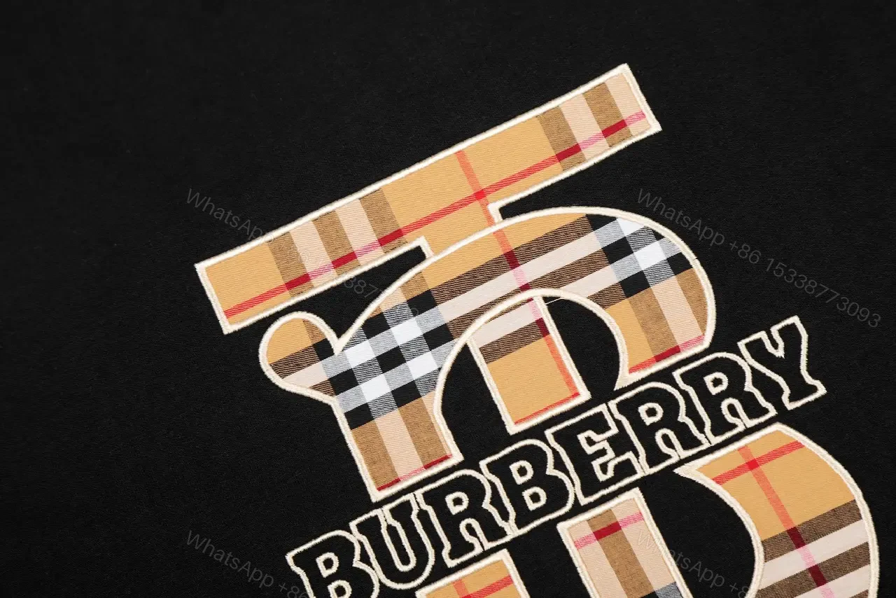 View 5 of Bold Logo Tee: Black Cotton, Modern Streetwear, Plaid Logo, Tee