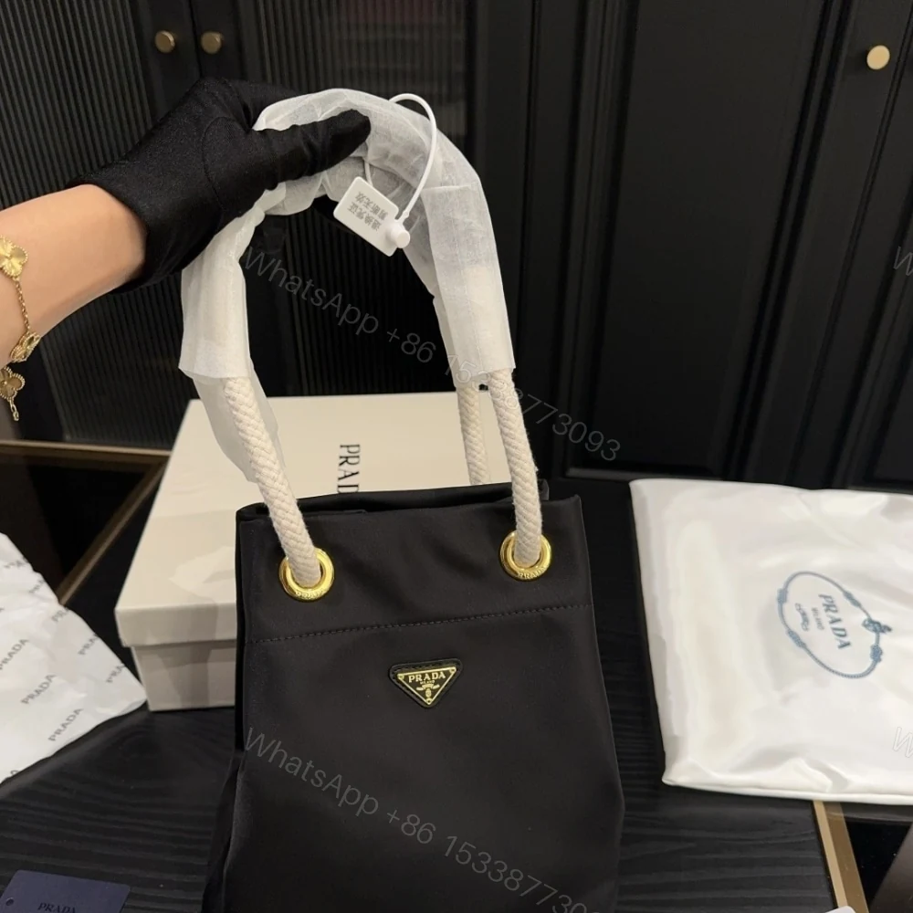 View 2 of PRADA MARINER RE NYLON SMALL BUCKET BAG BLACK 22CM 1BE082 2HG8 F0002 V OOO
