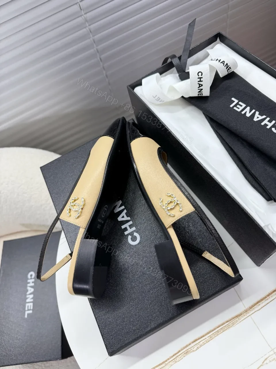 View 9 of Beige Leather Slingback Pumps with Glossy Cap Toe