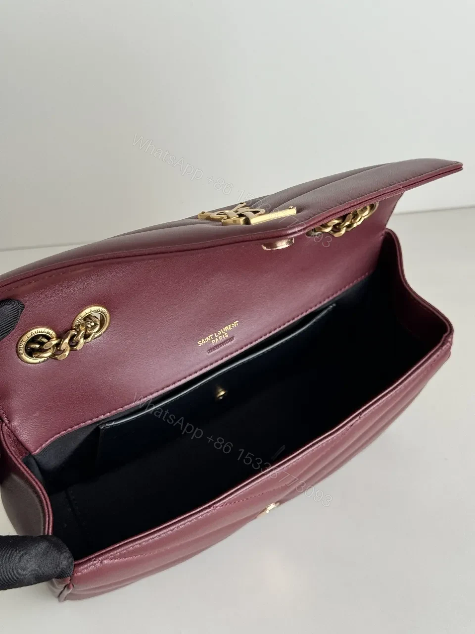 View 9 of Burgundy Quilted Satchel with Gold Chain Detail
