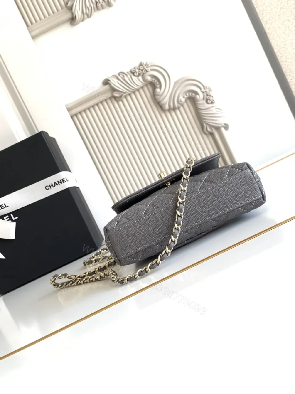 View 2 of Charcoal Leather Quilted Mini Bag with Gold Chain Accent
