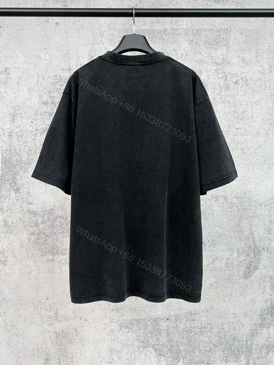 View 8 of Oversized Black Cotton Tee with Distressed Logo – Avant-Garde Streetwear