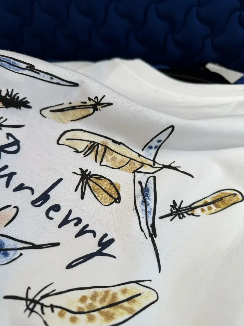 View 9 of White Cotton Oversized T-Shirt with Burberry Graphic Front
