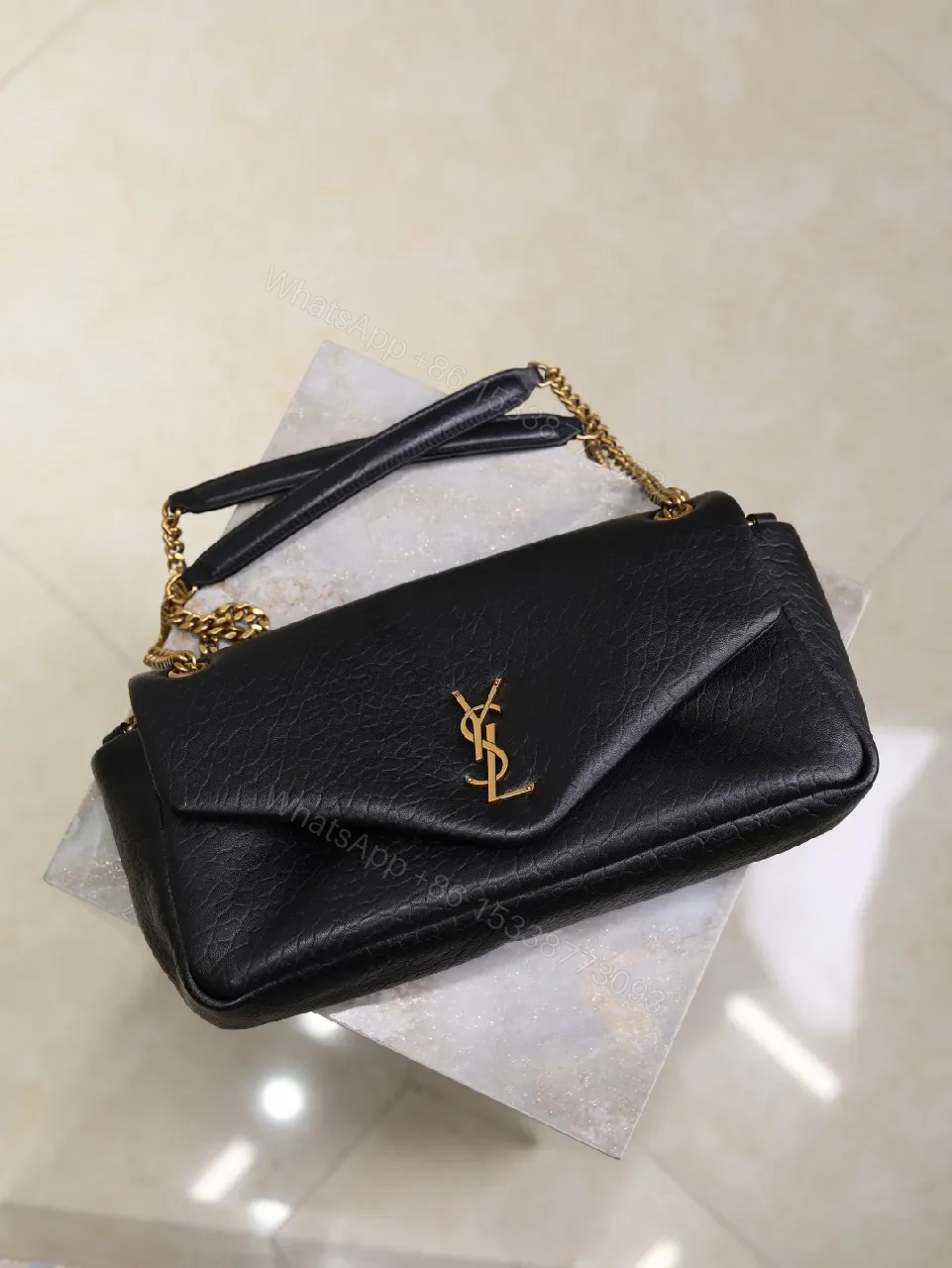 View 3 of Textured Leather Crossbody Clutch with Gold Logo hardware
