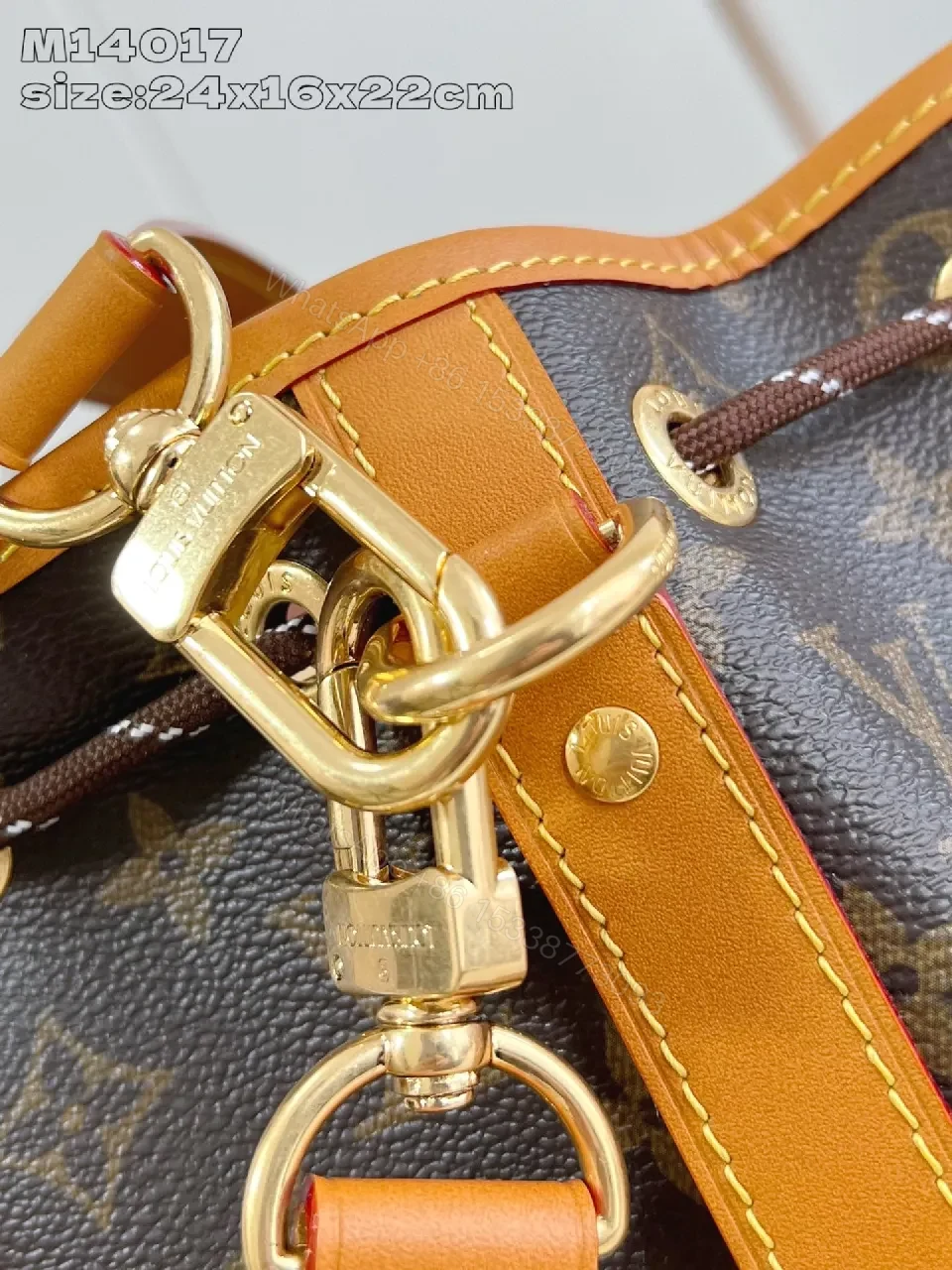 View 2 of Monogram Canvas Crossbody Bucket Bag with Leather Trim