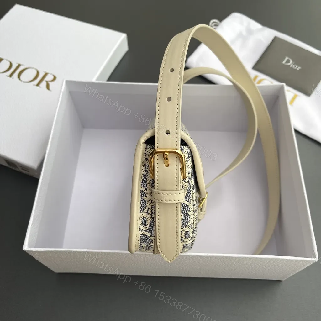 View 4 of Cream Leather-Trim Monogram Crossbody with Gold Turn-Lock, Compact Style