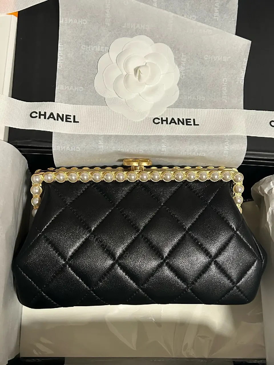 View 5 of Black Quilted Leather Clutch with Pearl Trim, Gold Frame, Elegant