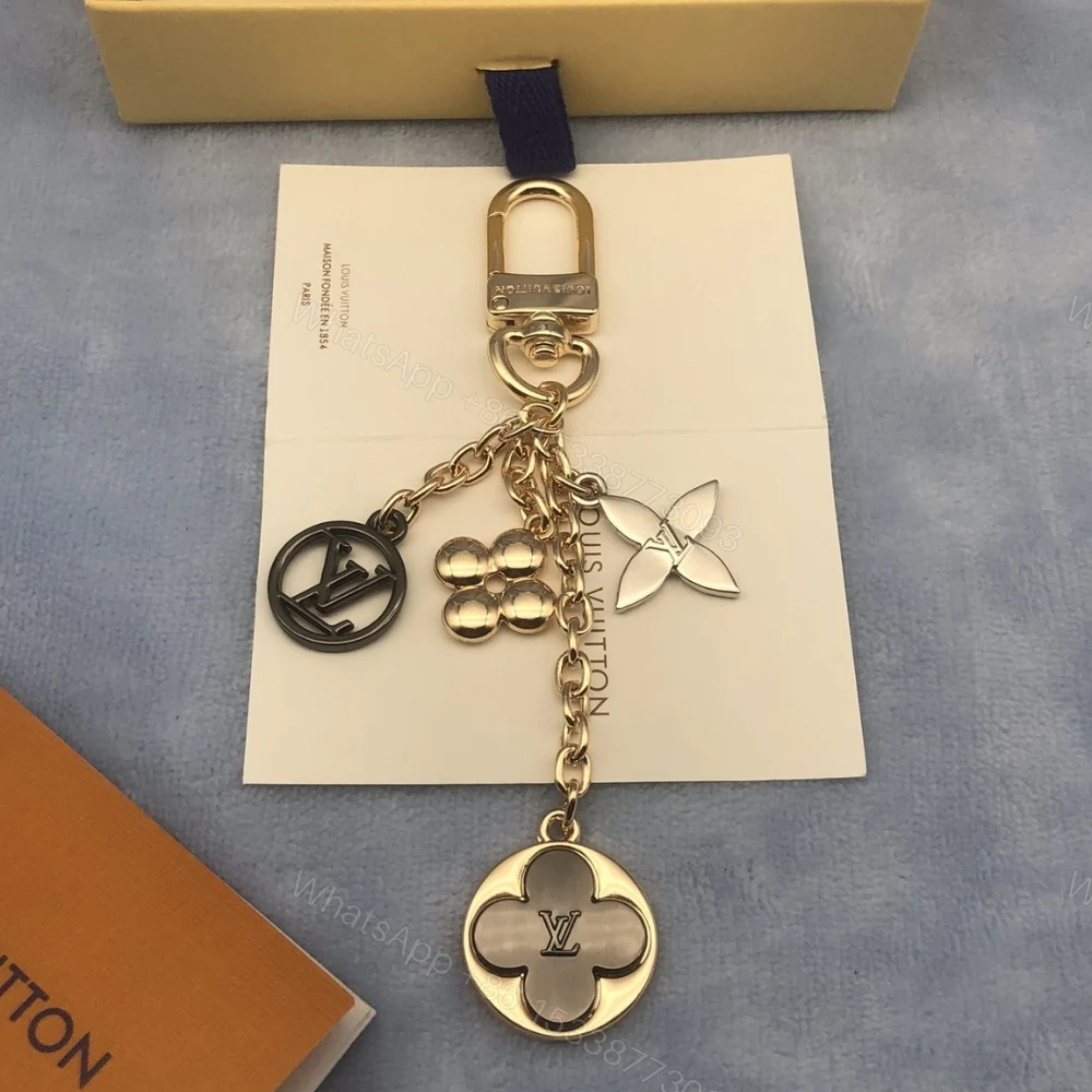 View 12 of Louis Vuitton Lv Bag Charm Key Holder