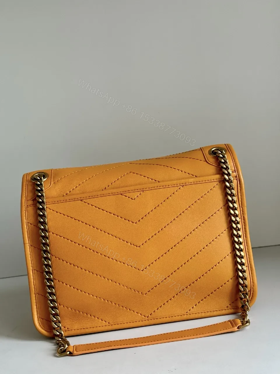 View 9 of Mustard Quilted Leather Crossbody with Chain Strap